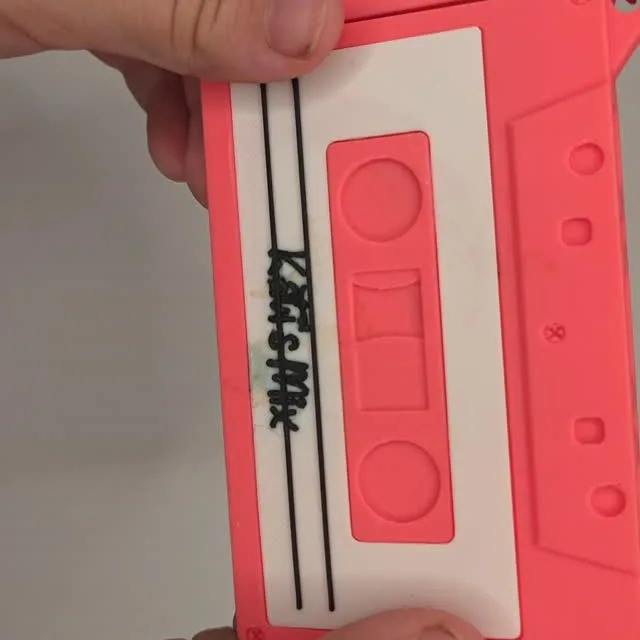 Pink cassette tape name tag